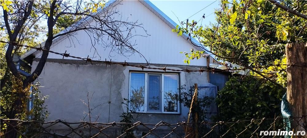 Casă cu teren și front stradal generos - Poză 2