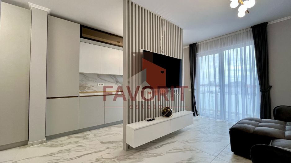 Etaj intermediar. Loc de parcare inclus. Finisat la cheie - Poză 1