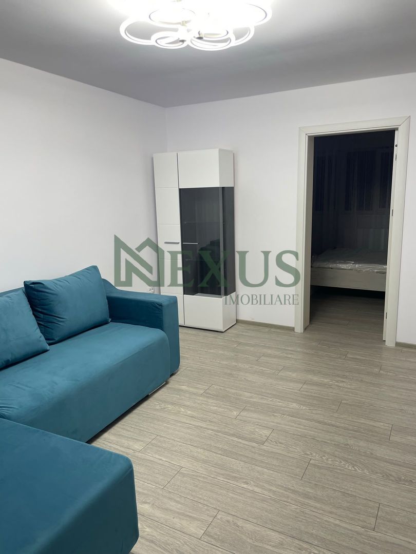 Apartament cu 2 camere, renovat complet, str.Libertății, Moinesti - Poză 1