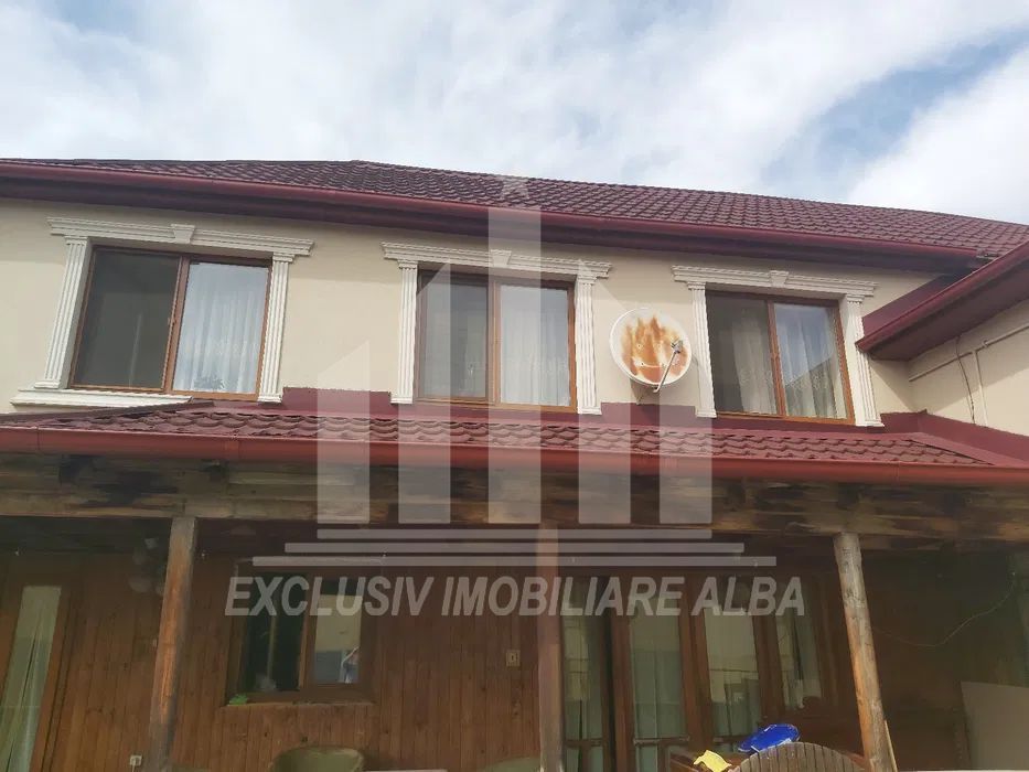 Casa de vanzare in Lipoveni - Poză 2