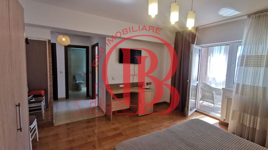 Garsoniera spatioasa mobilata si utilata - Poză 5