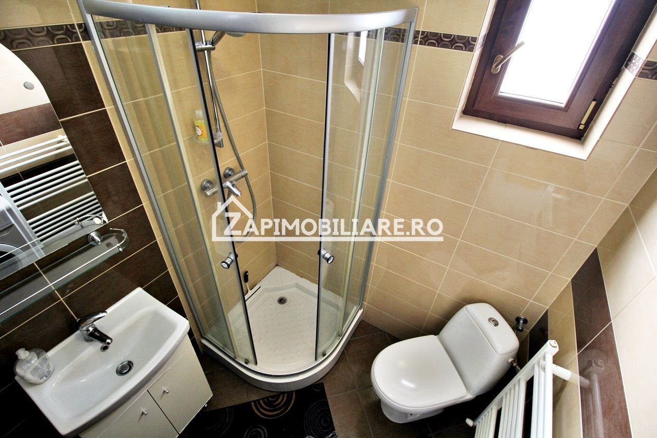 Casa 3 camere, 2 bai,1 garaj,teren 360 mp.zona Dambu Pietros - Poză 11