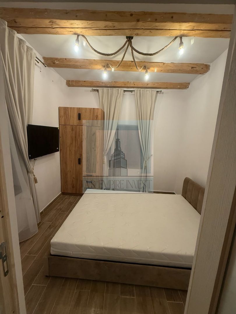 Garsonieră cochetă de închiriat în Schei - Poză 3