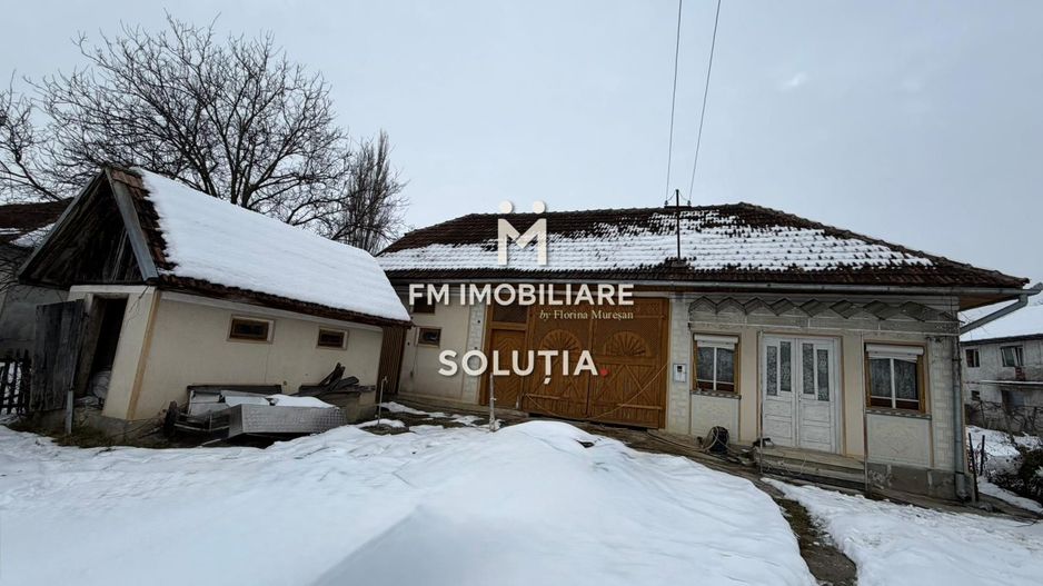 Casă cu teren generos în Buciumi - Poză 2