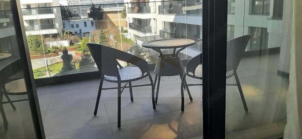 Apartament de închiriat 2 camere Nusco City Pipera | Vedere către grădina - Poză 10