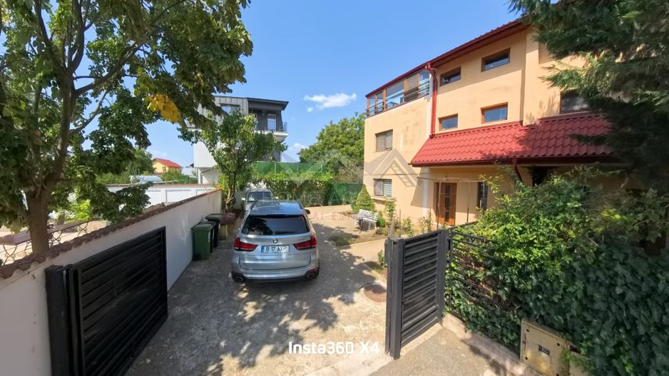 Casă individuală P+1+M cu garaj și terase spațioase – Otopeni Central - Poză 1