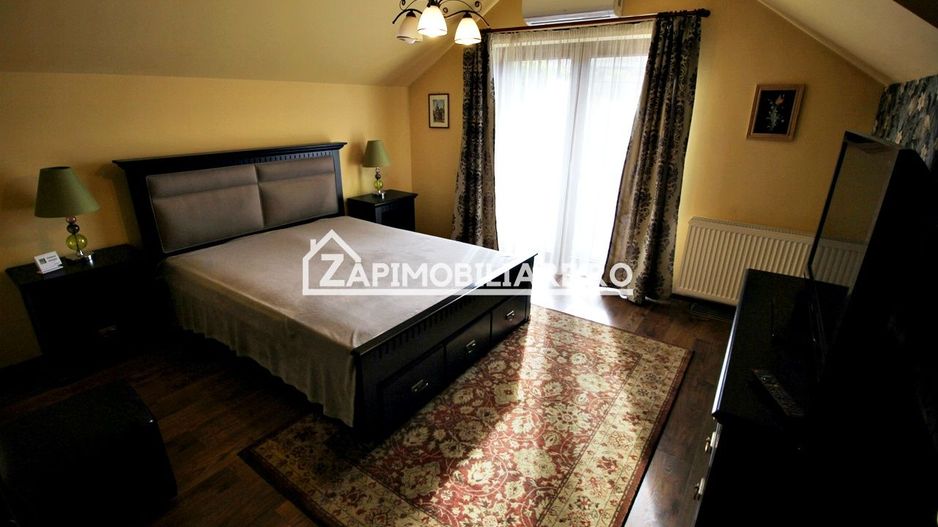 Casa 3 camere, 2 bai,1 garaj,teren 360 mp.zona Dambu Pietros - Poză 4