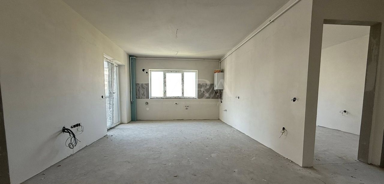 Apartament cu 3 camere semi-finisat în zona Eroilor, Florești. - Poză 2