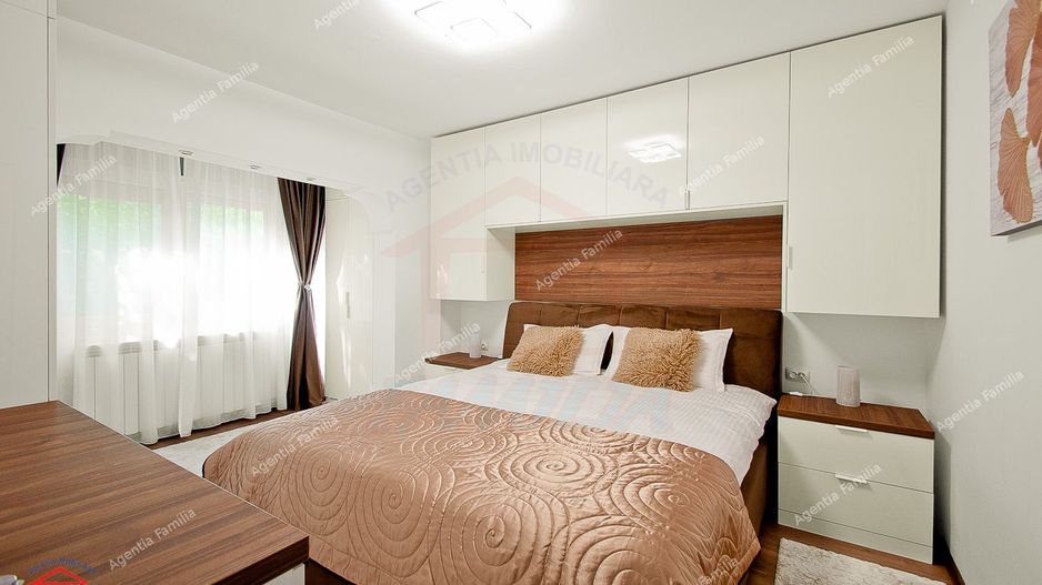 De închiriat apartament 3 camere, Micro 21 - Poză 1