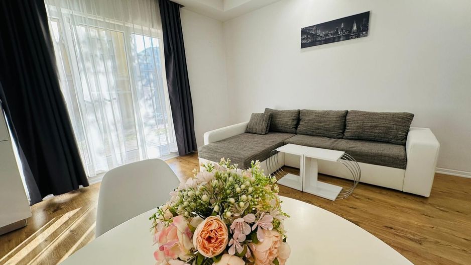 COSMOPOLIS - Apartament cu 2 camere si gradina, mobilat si utilat. - Poză 1
