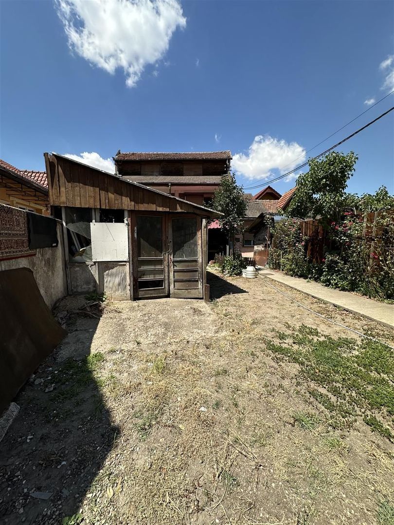 Casa individuala cu teren de 412 Piata Tineretului - Poză 7