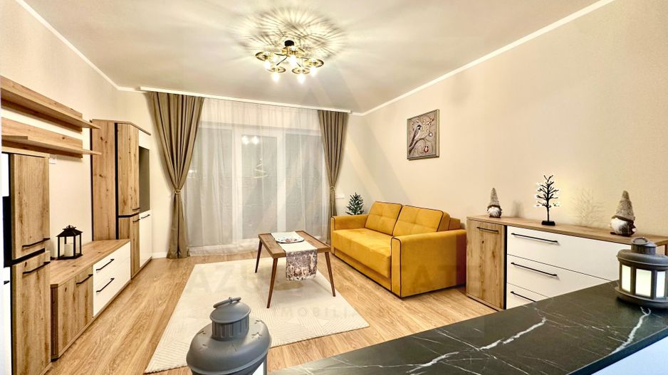 Apartament ultrafinisat 2 camere balcon 7.37 mp utili in Cristian - Poză 1