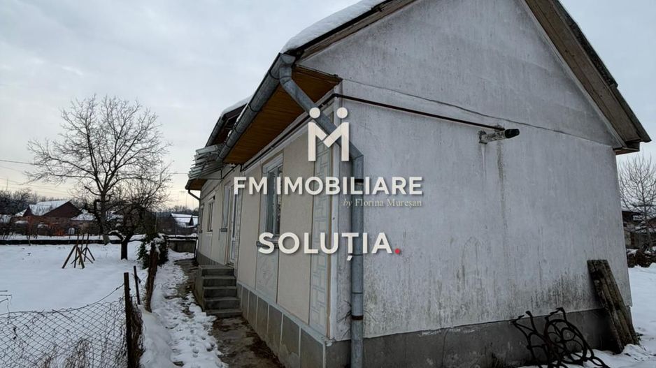 Casă cu teren generos în Buciumi - Poză 3