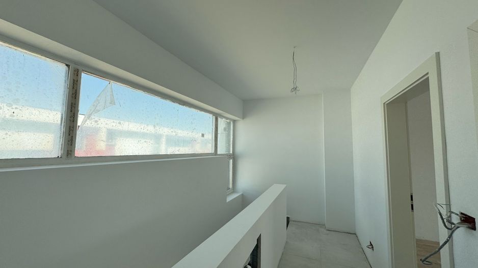 Townhouse modern cu grădină privată într-un cartier verde și sigur - Poză 3