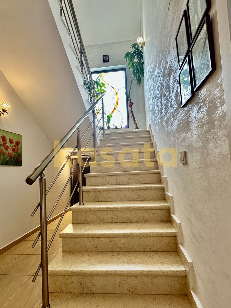 Vila care redefinește echilibrul între rafinament, spațiu și liniște - Poză 58