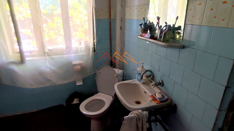 CASĂ DE VÂNZARE | 9 CAMERE | TEREN 1.000 MP | BĂICOI – ZONĂ CENTRALĂ - Poză 8