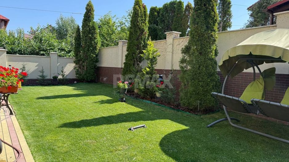 Casă exclusivistă în zonă premium – eleganță, confort și intimitate - Poză 4