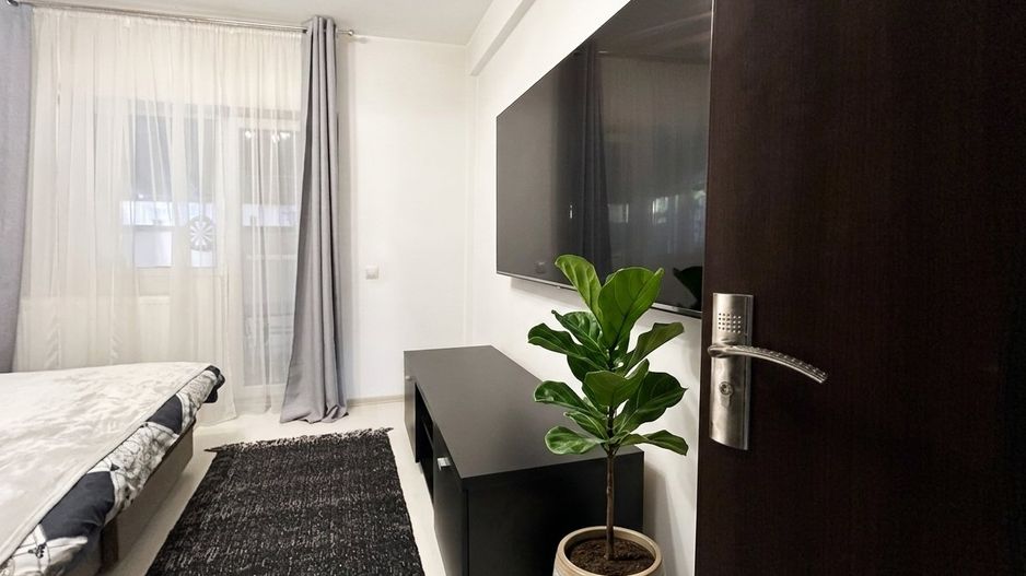 2 camere cu gradina de 35mp + parcare inclusa - Poză 11