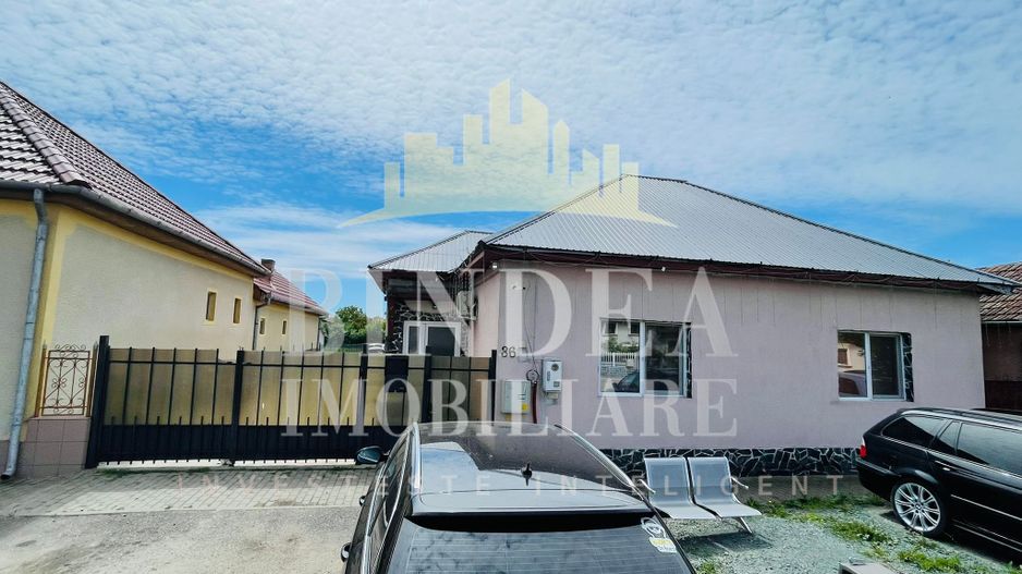 Casa individuala cu acces auto si hala- teren 1120mp - Poză 1