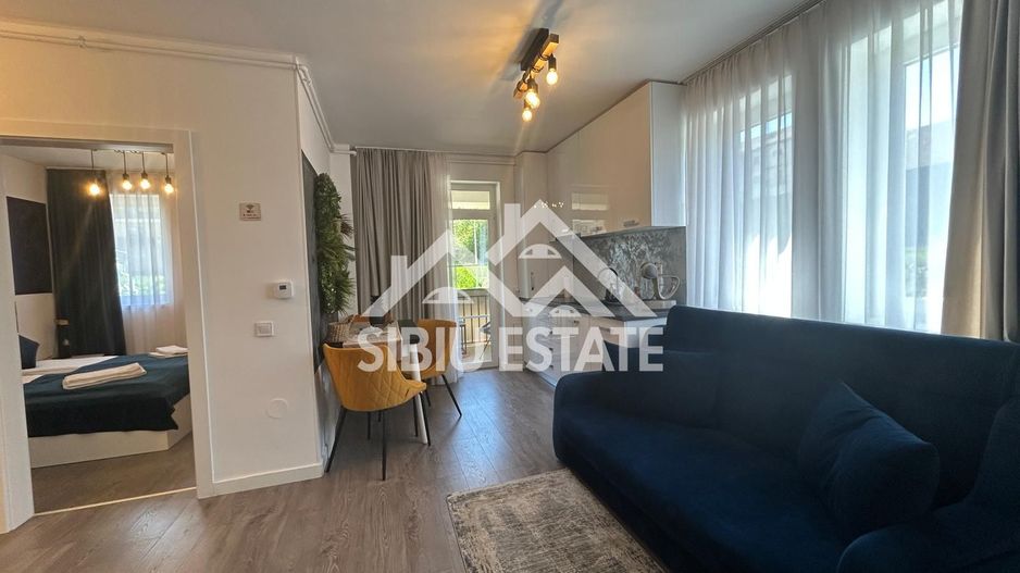 Apartament mobilat-utilat, cu 2 camere, balcon, parcare si boxa - Poză 1