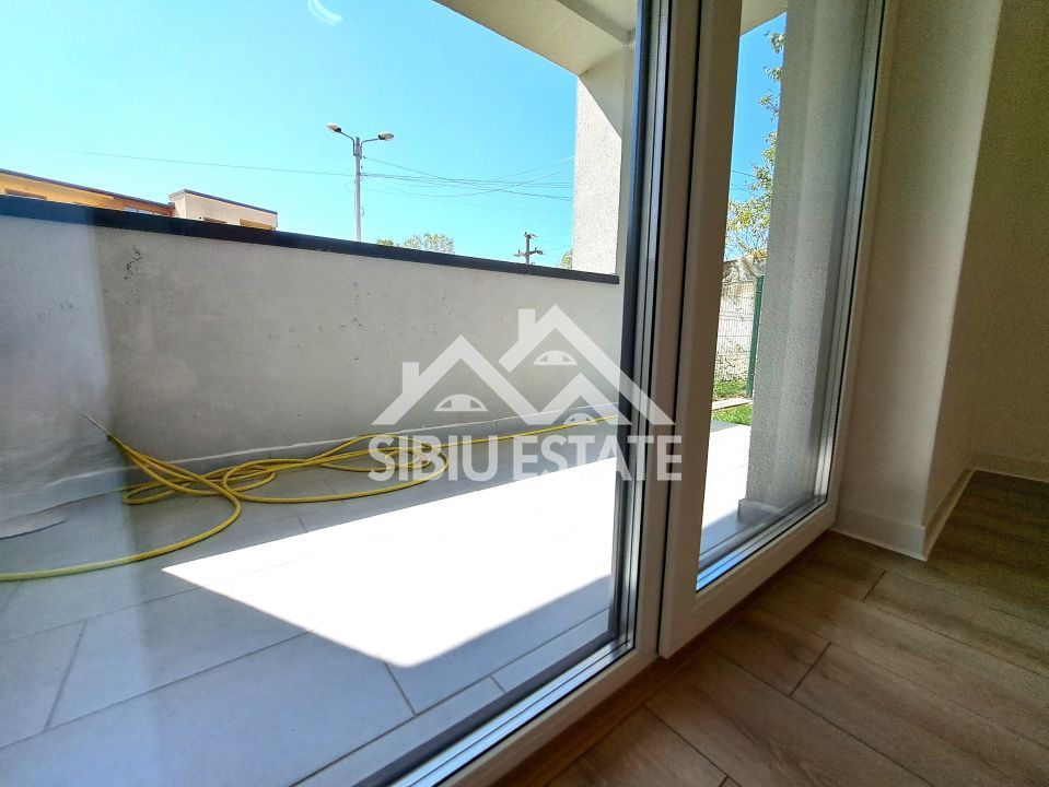 Apartament 61 mp modern finisat la cheie, gradina si terasa Selimbar - Poză 10