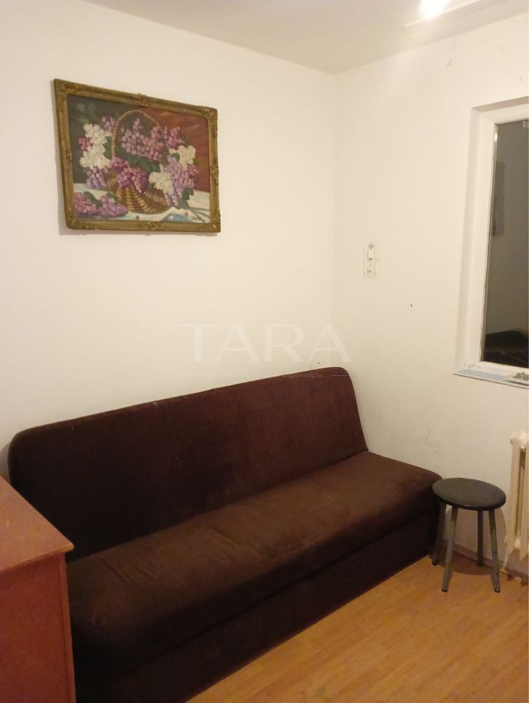 Garsonieră de vânzare,  etaj 2, baie proprie, zonă liniștită. - Poză 1