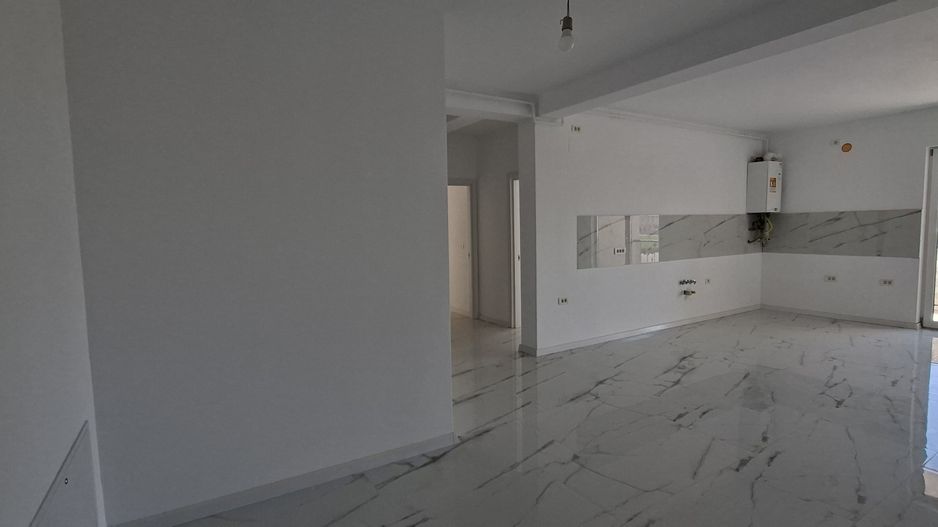 Apartament cu 3 camere si un loc de parcare - Poză 2