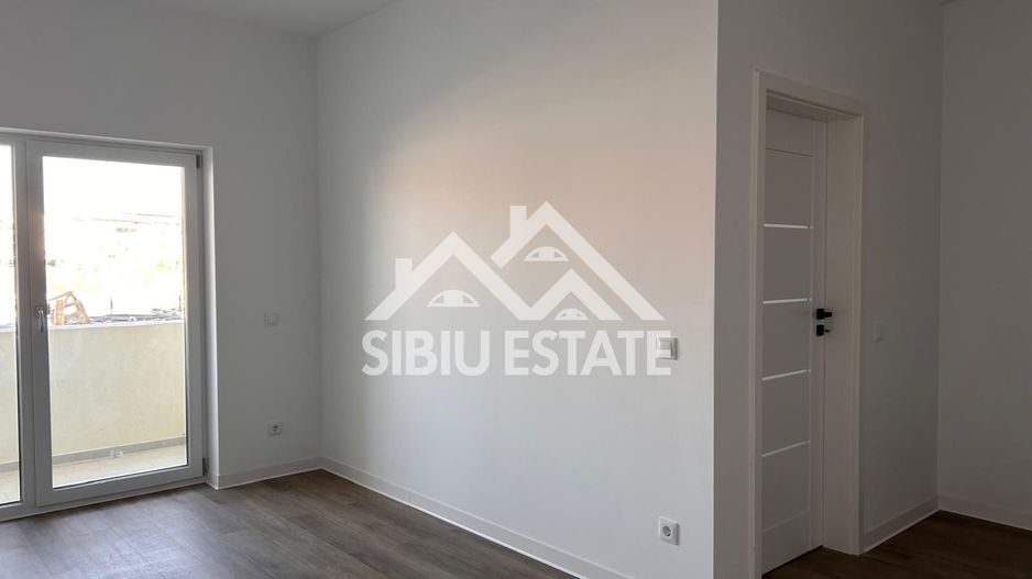 Garsoniera 41 mp, balcon bucatarie separata , intabulata zona Brana - Poză 12