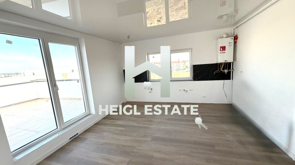 Apartament de tip penthouse cu 45 mp terasa - Poză 3