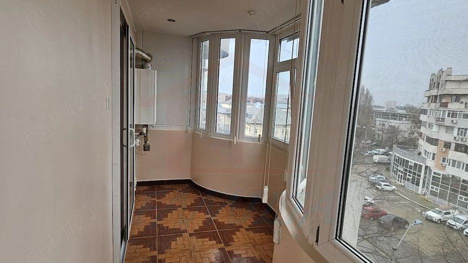 De închiriat apartament 2 camere decomandat -- Baia Comunală - Poză 6