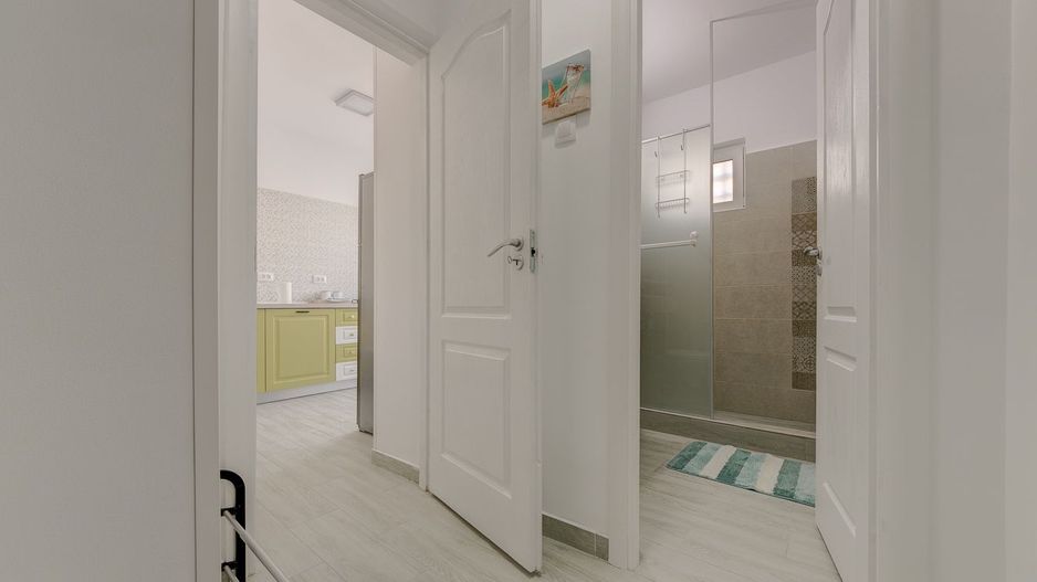 Apartament 2 cam P-ta Romana Bd. Gheorghe Magheru Bloc EVA - Poză 7