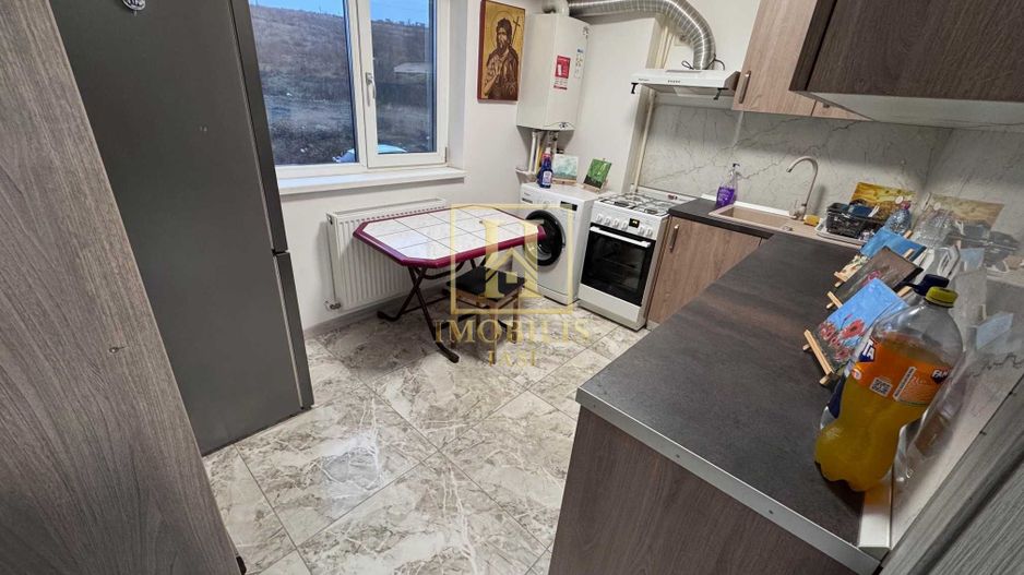 Apartament 1 camera Dec 38 mp Bucium 66500 euro. - Poză 3