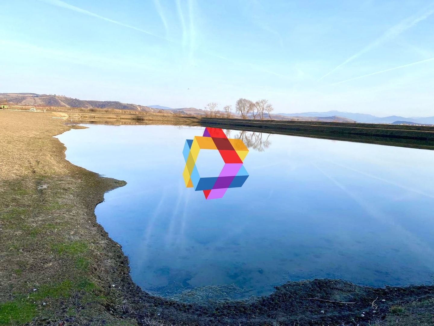 Teren 11 ha cu heleșteu 3 ha - Poză 1