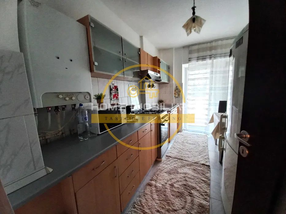 Apartament de inchiriat cu 2 camere Decomandat / Etajul 1/ 70mp/ zona Pacurari - Poză 2