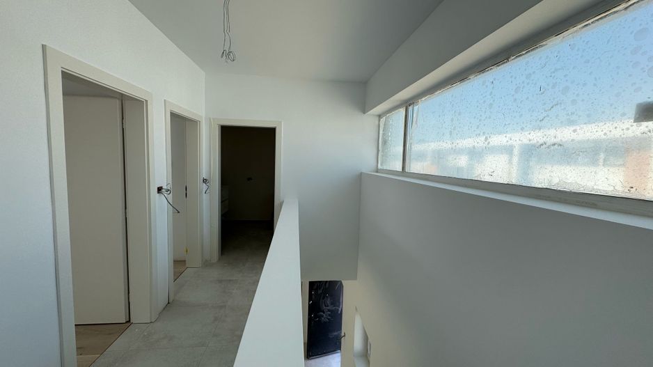 Townhouse modern cu grădină privată într-un cartier verde și sigur - Poză 5