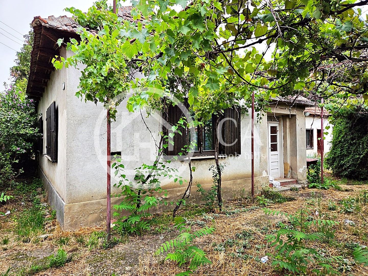 Casa de vanzare cu 4 camere si teren de 1520 in satul Batar, Bihor - Poză 5