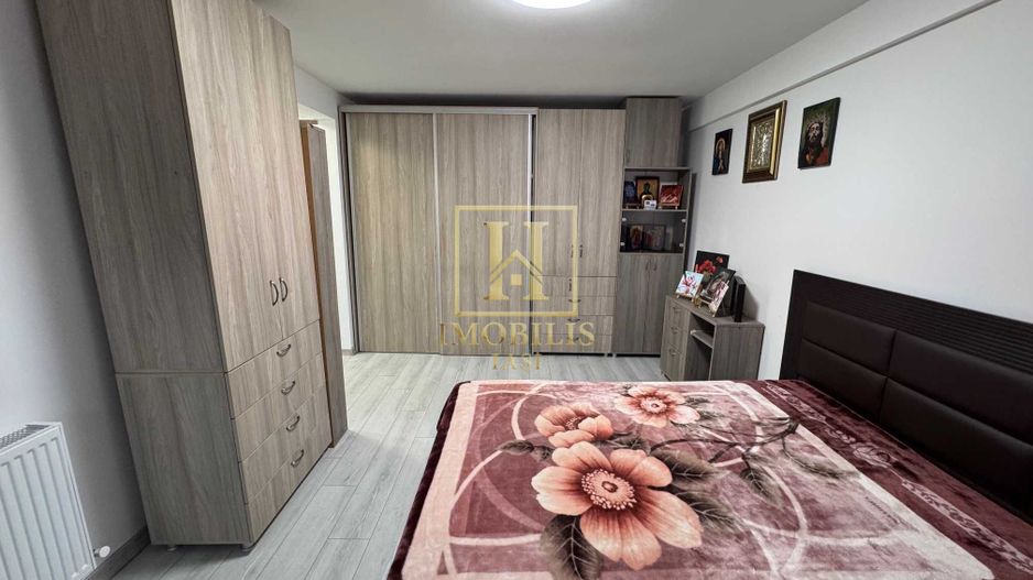 Apartament 1 camera Dec 38 mp Bucium 66500 euro. - Poză 4