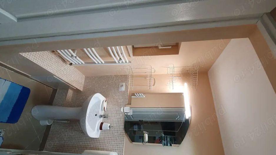 Închiriez garsonieră la casă,  Unirii, centrală proprie - Poză 6