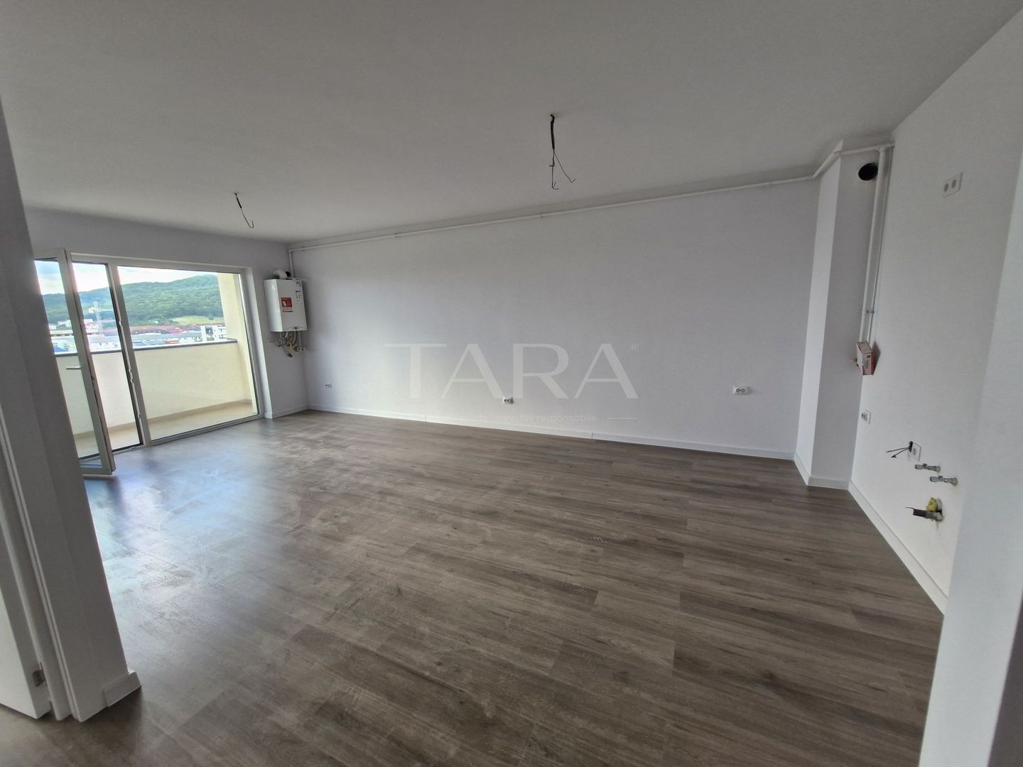 Apartament cu 2 camere, balcon 10 mp, parcare subterană inclusă. - Poză 2