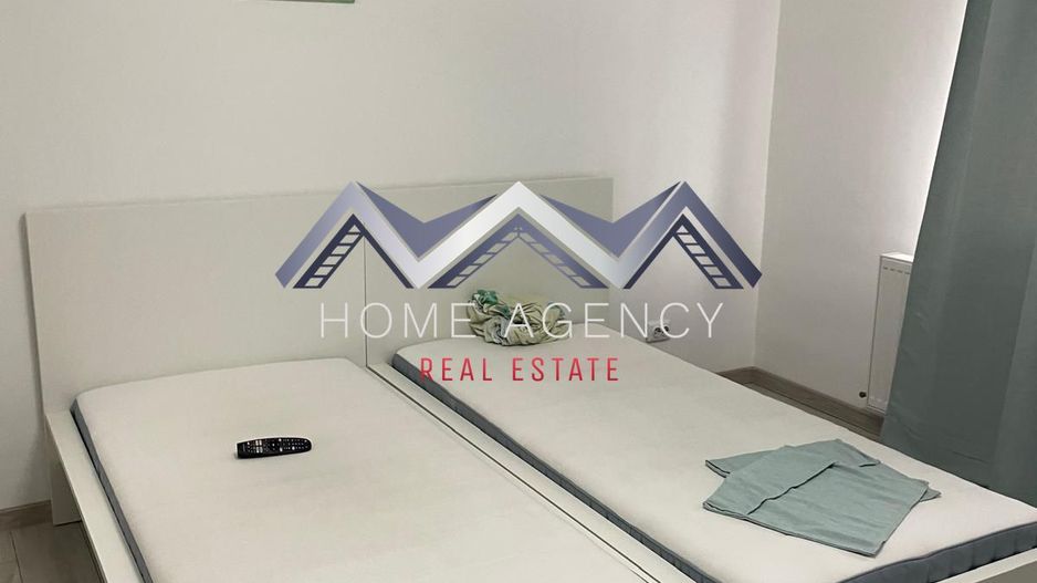 Garsonieră cu bucătărie închisă | include parcare - Poză 1