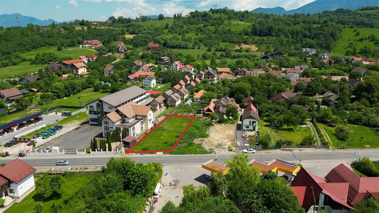 Teren intravilan,cu utilitati, front stradal apreciabil - Poză 4
