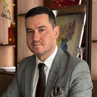 Razvan Crainiceanu - Pinwell Realty