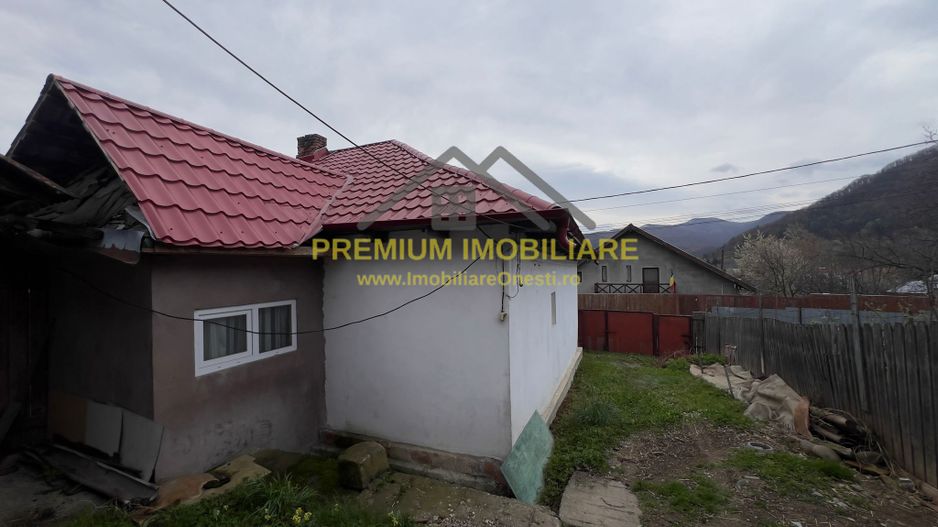 Casa de vanzare in statiunea turistica Tg-Ocna - Poză 2