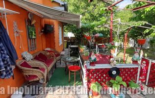 Casă de cărămidă, cu 4 camere, 417mp teren, lăngă Gara de Sud, Tecuci