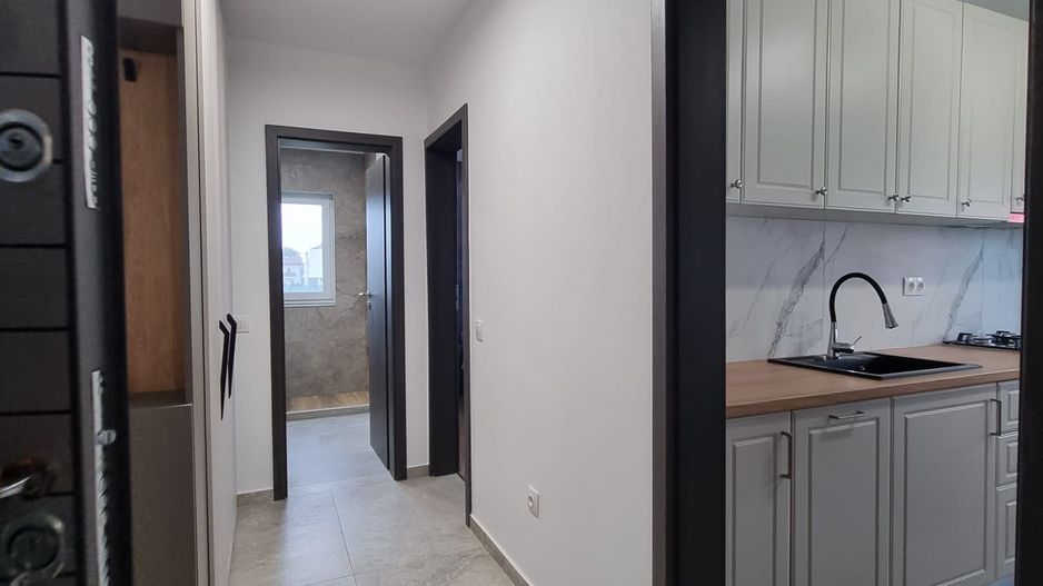 De vanzare apartament 2 camere cu gradina - Poză 8