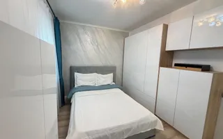 Casa P+1+M cu teren de 650 mp, piscina si curte complet amenajata - Poză 23