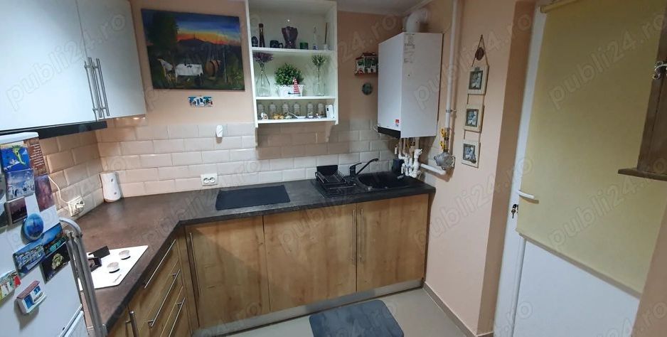 Închiriez garsonieră la casă,  Unirii, centrală proprie - Poză 3