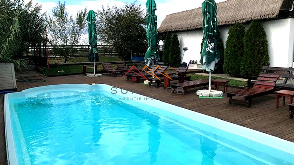 De vanzare pensiune 14 camere, teren 1500 mp, multiple dotari - Poză 1