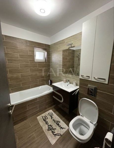Apartament elegant cu grădină proprie în imobil nou. - Poză 6