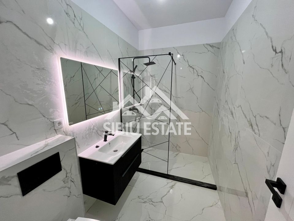 Apartament cu 3 camere, 2 bai, boxa 20 mp. loc de parcare -Finisat la cheie - Poză 6